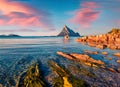 Peak of Tavolara mountain on background. Stunning summer seascape of Mediterranean Sea, Porto Taverna beach, Sardinia island, Ital Royalty Free Stock Photo