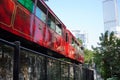 The Peak Tram, a Funicular Railway and Landmark of Hong Kong. Medium Shot, Low Angle View