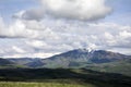 Peak with Utah Snow capped mountains with rolling green hills Royalty Free Stock Photo