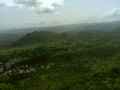 Peak view from sajjangarh palace green aravali hils and sky and udaipur city