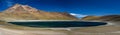 Peak volcano panoramic mountains lake water top snow blue sky