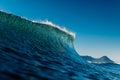Peak of the wave in tropical ocean. Crashing perfect wave, ideal for surfing Royalty Free Stock Photo