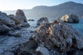 Peaked rocks on seashore. Royalty Free Stock Photo