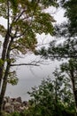 Peaking through the tree line over Jordan Pond in Acadia National Park, Maine, USA Royalty Free Stock Photo