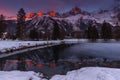 Peaks of Aiguilles of Chamonix at sunset in a cold winter day viewed from Lake das Gaillands Royalty Free Stock Photo