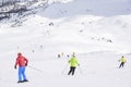 The peaks of the Alps mountains covered with snow. the ski slopes crowded with skiers on a sunny winter day Royalty Free Stock Photo