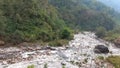 The peaks of the asia mountain, a small noisy strem of water