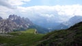 Peaks, lake and clouds of Drei Zinnen area, Tre Cime di Lavaredo in Dolomiten mountains, Italy Royalty Free Stock Photo