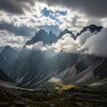 Peaks of mountain range soar beneath a dramatic sky filled with dense Royalty Free Stock Photo