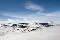 Peaks of mountains above the clouds, mountain Dalsnibba view to Geiranger fjord, Norway Royalty Free Stock Photo