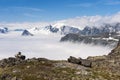 Peaks of mountains above the clouds, mountain Dalsnibba view to Geiranger fjord, Norway Royalty Free Stock Photo