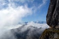 Peaks towering above the clouds Royalty Free Stock Photo