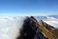 Peaks towering above the clouds Royalty Free Stock Photo