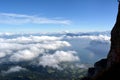Peaks towering above the clouds Royalty Free Stock Photo