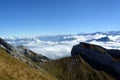 Peaks towering above the clouds Royalty Free Stock Photo