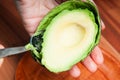 Pealing avocado Royalty Free Stock Photo