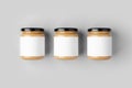 Peanut, almond, nut butter jar mockup with blank label. Three jars Royalty Free Stock Photo