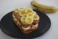 Peanut butter banana honey toast sandwich, an easy breakfast idea Royalty Free Stock Photo