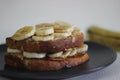 Peanut butter banana honey toast sandwich, an easy breakfast idea Royalty Free Stock Photo