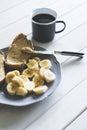 Peanut butter bread and banana for breakfast Royalty Free Stock Photo