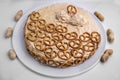 Peanut butter and chocolate cake with pretzels