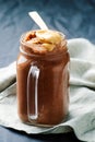 Peanut Butter Chocolate Overnight Oats in to the jar