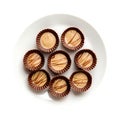 Peanut Butter Cups On White Plate On A White Background