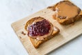 Peanut Butter and Jelly Sandwich with Toast Bread and Raspberry Jam Marmalade Royalty Free Stock Photo