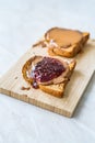 Peanut Butter and Jelly Sandwich with Toast Bread and Raspberry Jam Marmalade Royalty Free Stock Photo