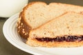 Peanut butter and jelly sandwich on wheat bread Royalty Free Stock Photo