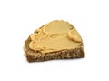 Peanut butter on a slice of homemade multigrain bread. Royalty Free Stock Photo