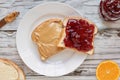 Peanut Butter and Strawberry Jelly Sandwich with Fruit Royalty Free Stock Photo