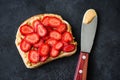 Peanut butter toast with fresh strawberries Royalty Free Stock Photo
