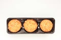 Peanut cookies in a box. Biscuits pack on white background. Royalty Free Stock Photo
