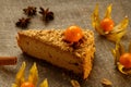 Peanut cream cheese cake with cape gooseberries. Royalty Free Stock Photo