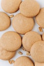 Peanut macarons flat lay on white background, minimal dessert texture Royalty Free Stock Photo