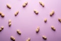 Peanut minimal pattern on purple background backdrop food nut texture