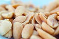 Peanut Nuts on foreground macro shooting Royalty Free Stock Photo