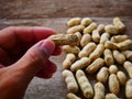 Peanut open shell on group of peanuts close shell Royalty Free Stock Photo