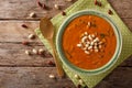 Peanut puree soup with greens close-up on a table. horizontal to Royalty Free Stock Photo