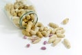 Peanut with shells and glass jar Royalty Free Stock Photo