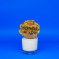 Peanutbutter m&m\'s Cookie on a glass of milk