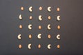 Peanuts and cashews on a black background pattern Royalty Free Stock Photo