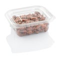 Peanuts groundnuts in a transparent plastic container