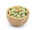 Peanuts nori wasabi flavour coated in wooden bowl isolated on white background Royalty Free Stock Photo