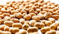 Peanuts that are opened and whose contents are coming out isolated on a white Royalty Free Stock Photo