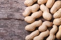 Peanuts in shell closeup on a wooden table. macro.