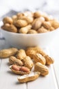 Peanuts in shell. Groundnuts on white table Royalty Free Stock Photo