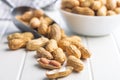 Peanuts in shell. Groundnuts on white table Royalty Free Stock Photo