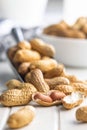 Peanuts in shell. Groundnuts on white table Royalty Free Stock Photo